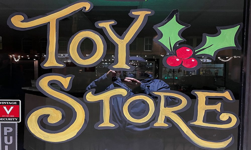 2023 Christmas Window Contest Winners - Window painting with text 'Toy Store'